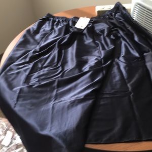 Plus sized navy satin skirt with pockets